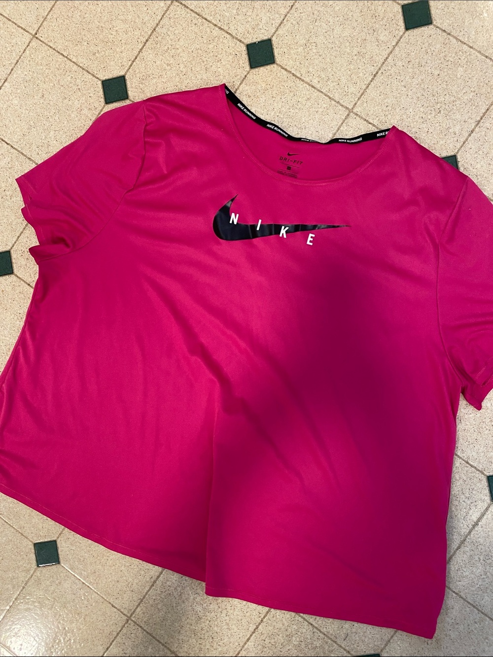 Nike Women's Hot Pink Short Sleeve Dri-FIT Tee with Black Swoosh